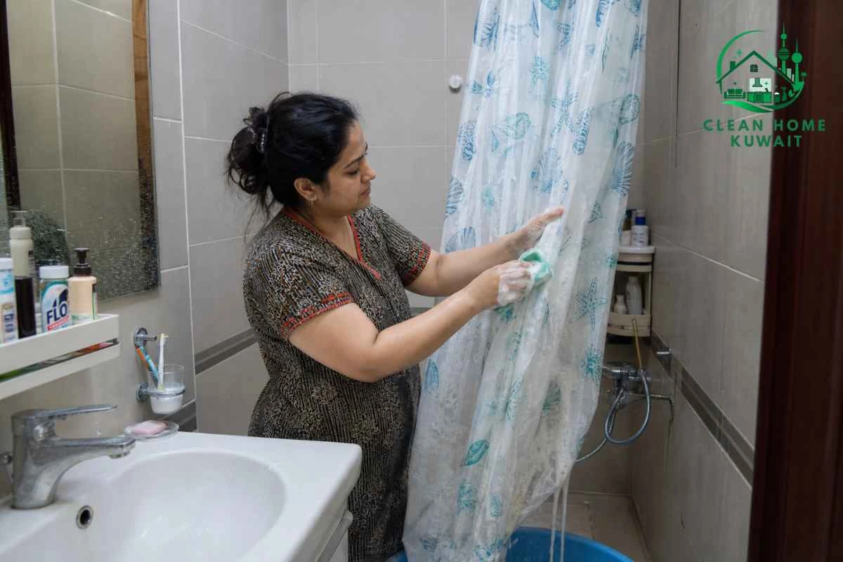 A women is Cleaning Curtains in House Cleaning Kuwait